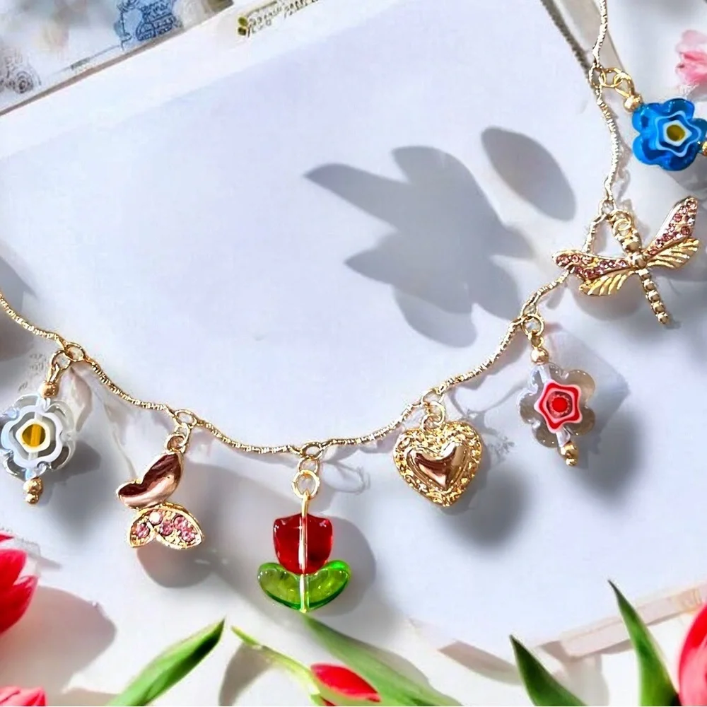 Gold and Red toned Charm Necklace glass rhinestones enamel tulip flower hearts